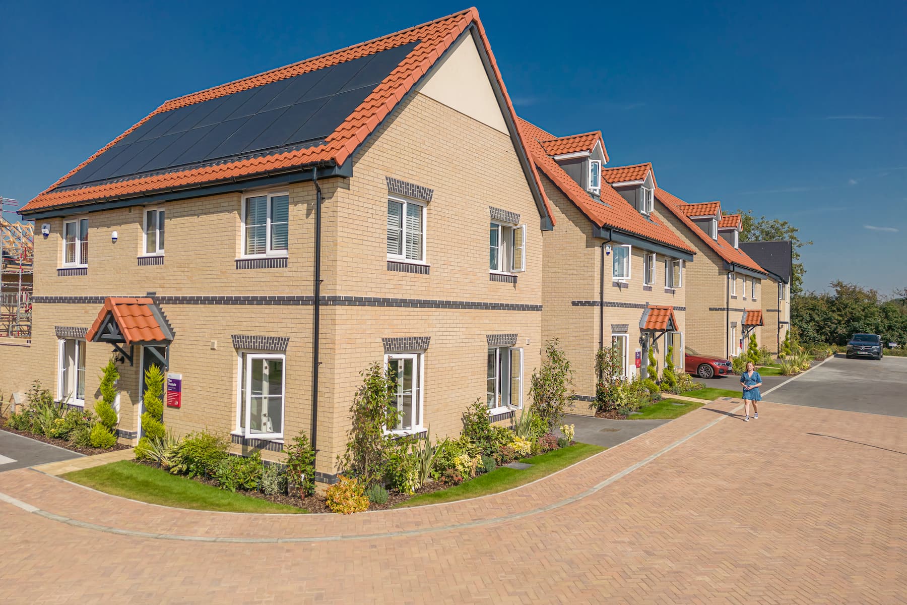 Taylor Wimpey street scene, home with PV panels