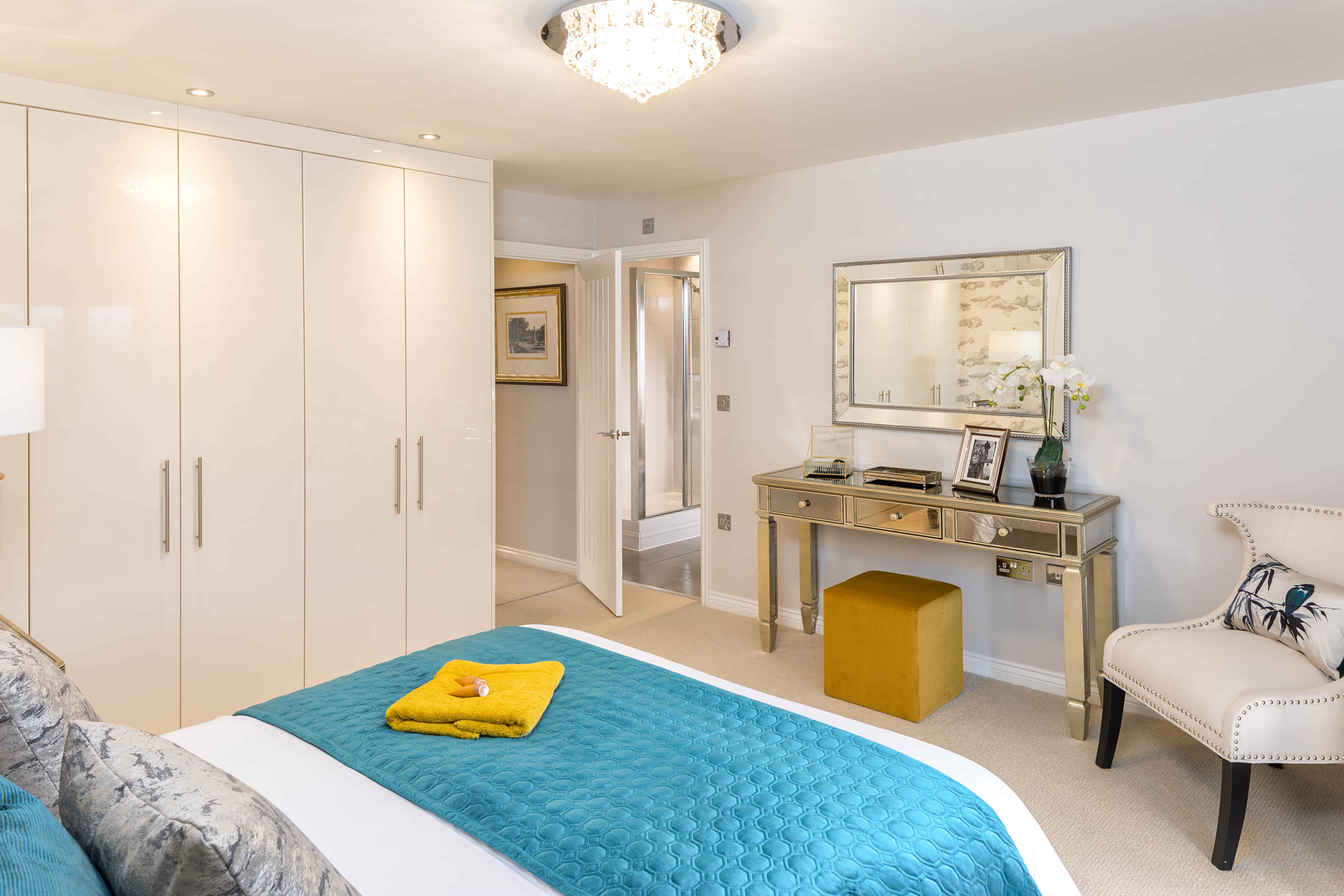 light bedroom with blue sheets