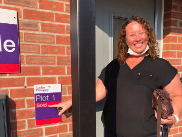 New homeowner in doorway