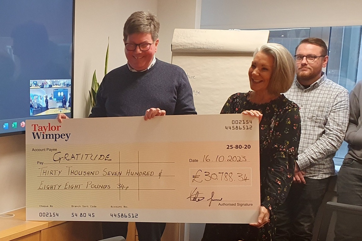 Gratitude and Taylor Wimpey with the cheque