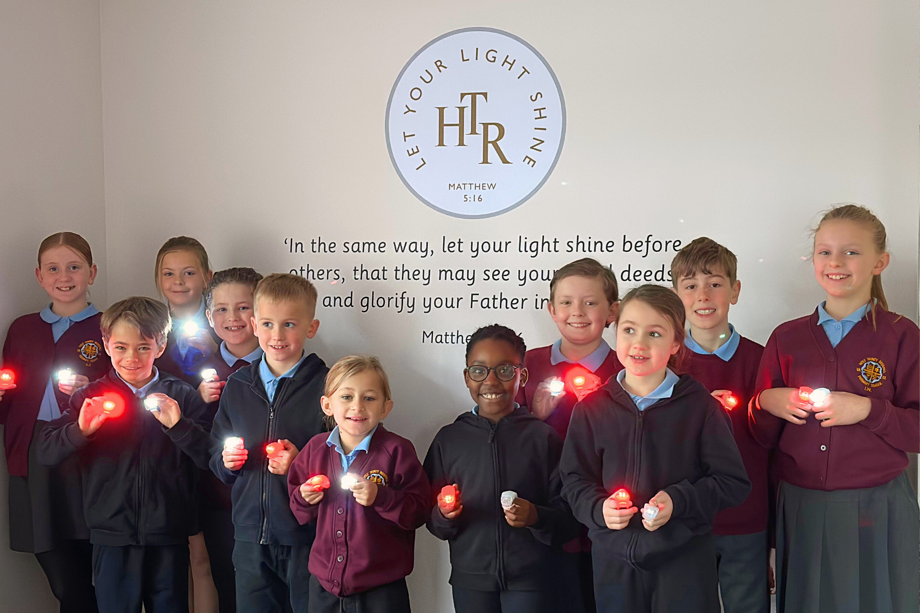 Holy Trinity C of E School pupils with their lights 