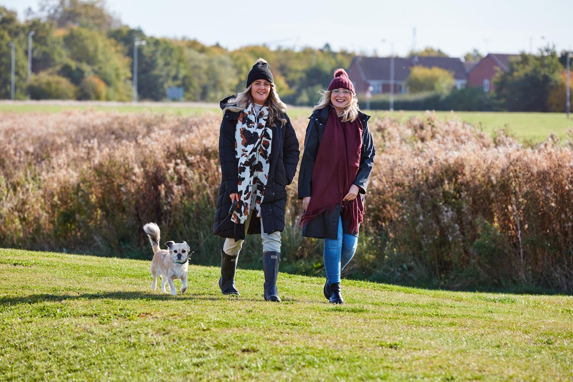 People walking dog