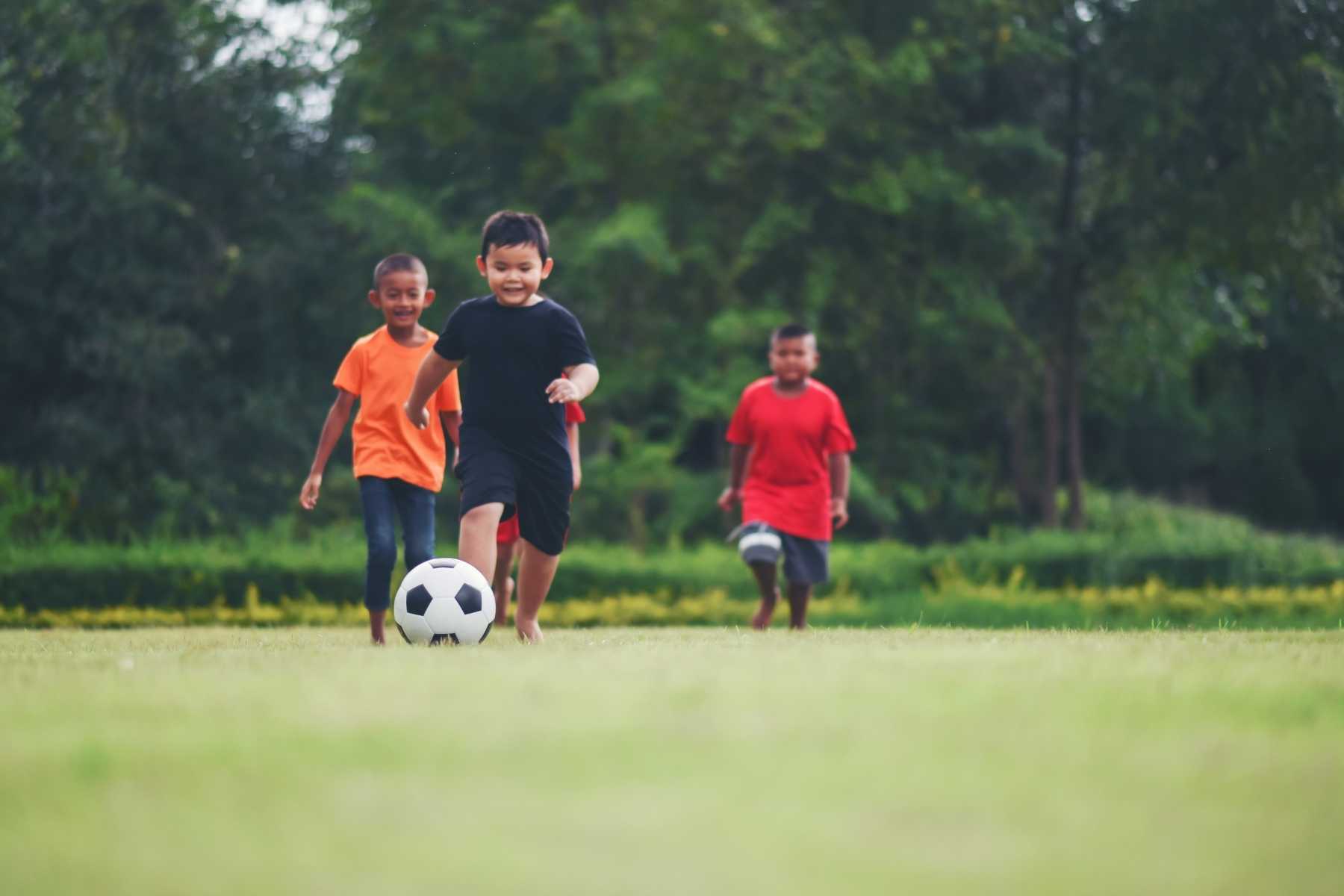 Kids playing football