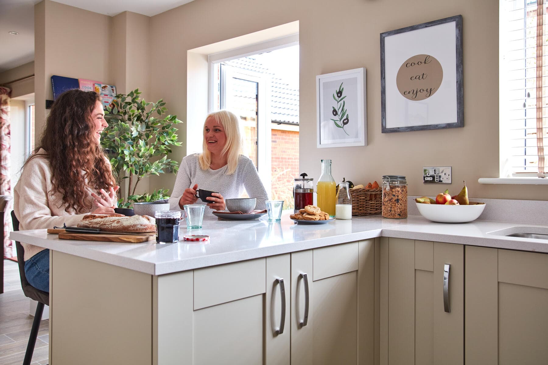 Sitting at breakfast bar in kitchen