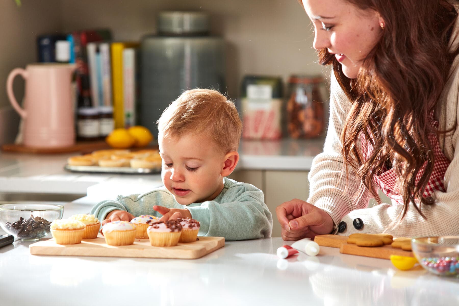 Mother and child baking