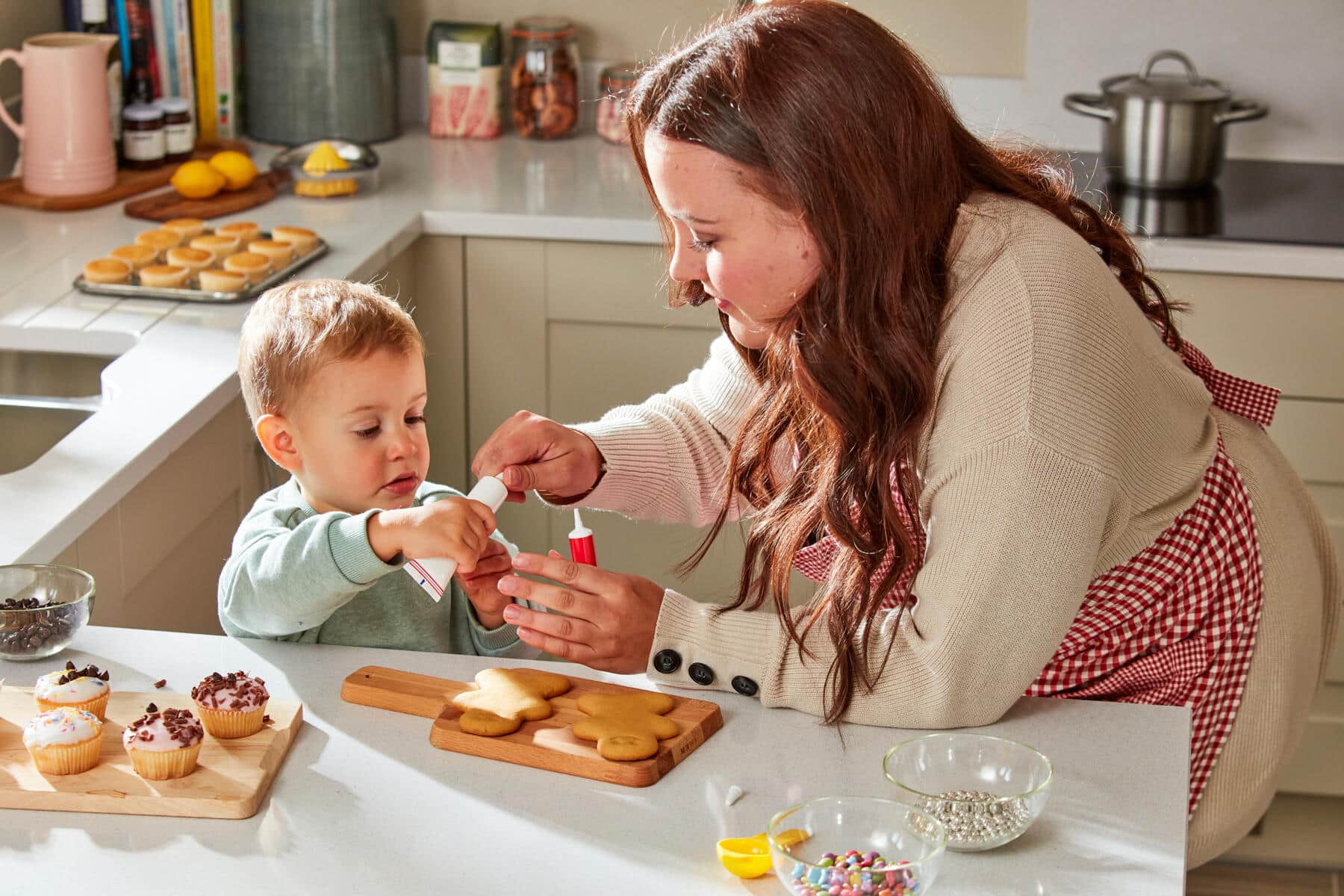 Mother and child in kitchen