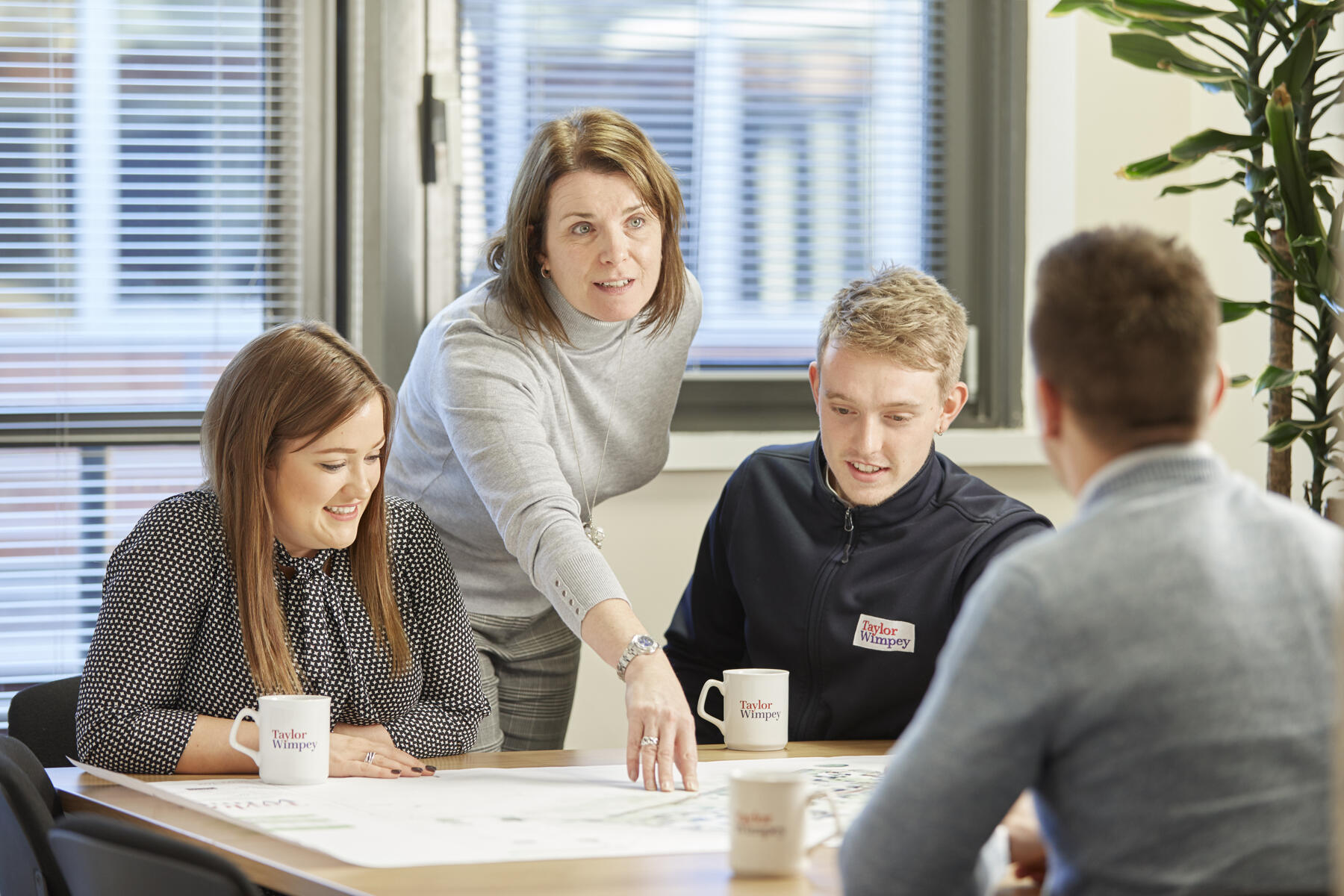 Colleagues discussing plans