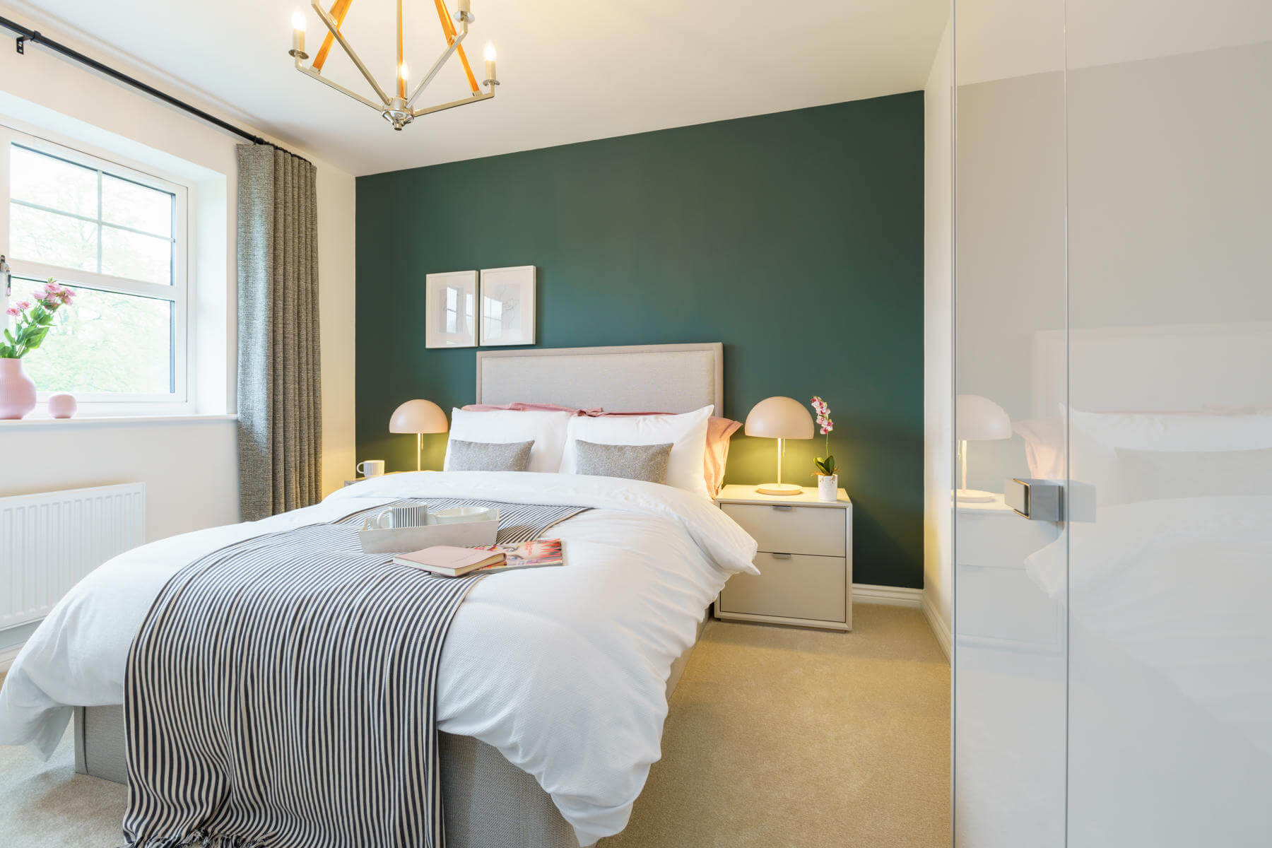 Bedroom with green feature wall