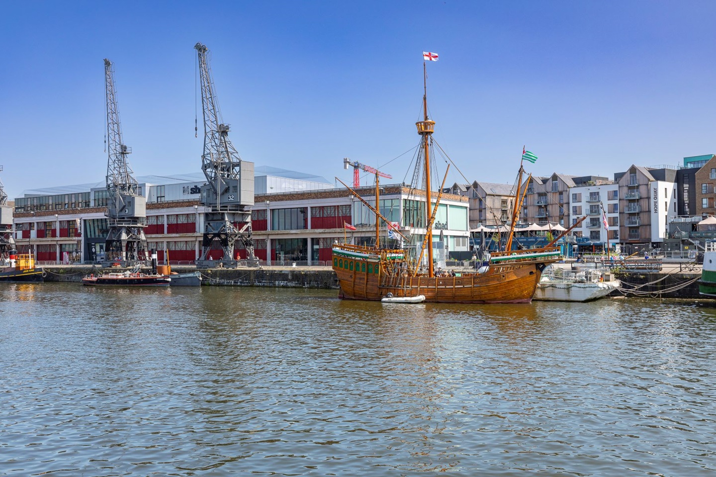 M Shed and Wapping Wharf with the Matthew Boat on Bristol Harbourside