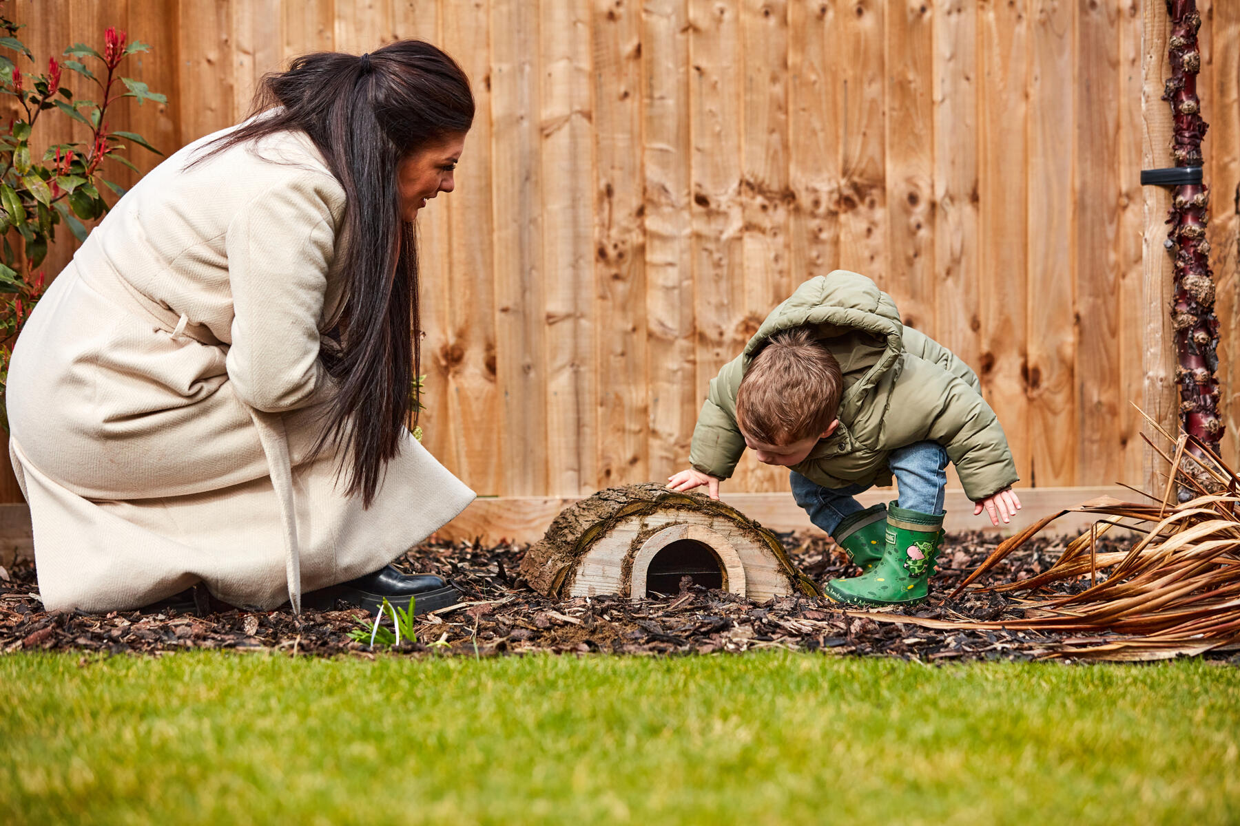 Mum and son in garden