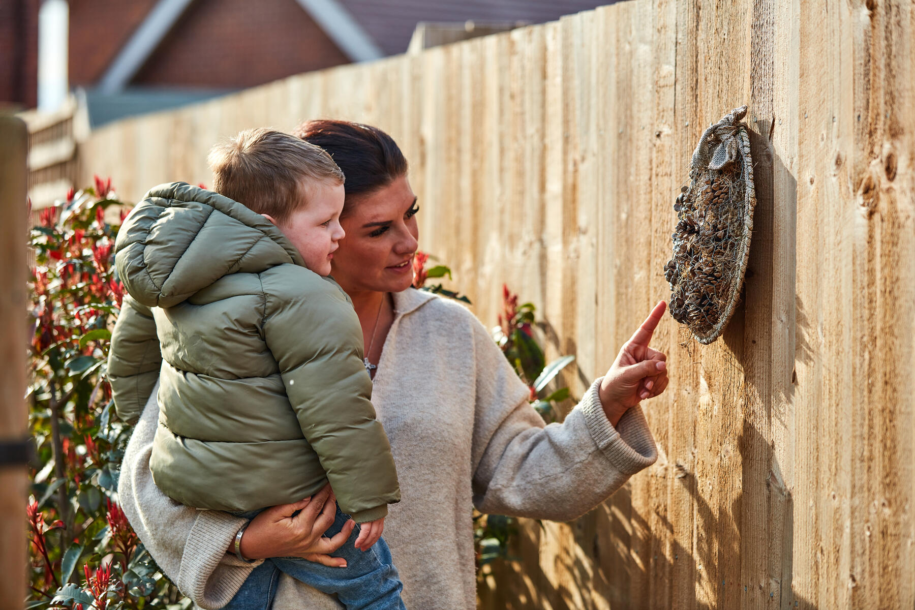 Mum and son in garden