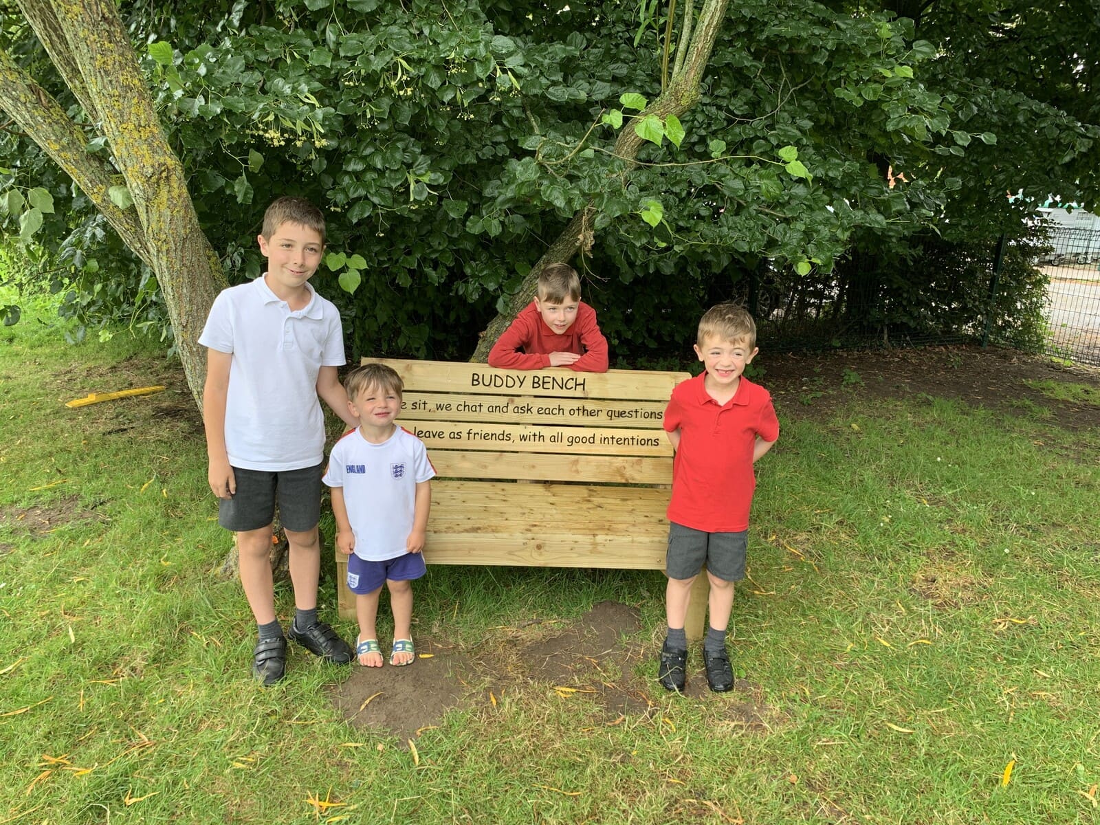 Children sitting on bench