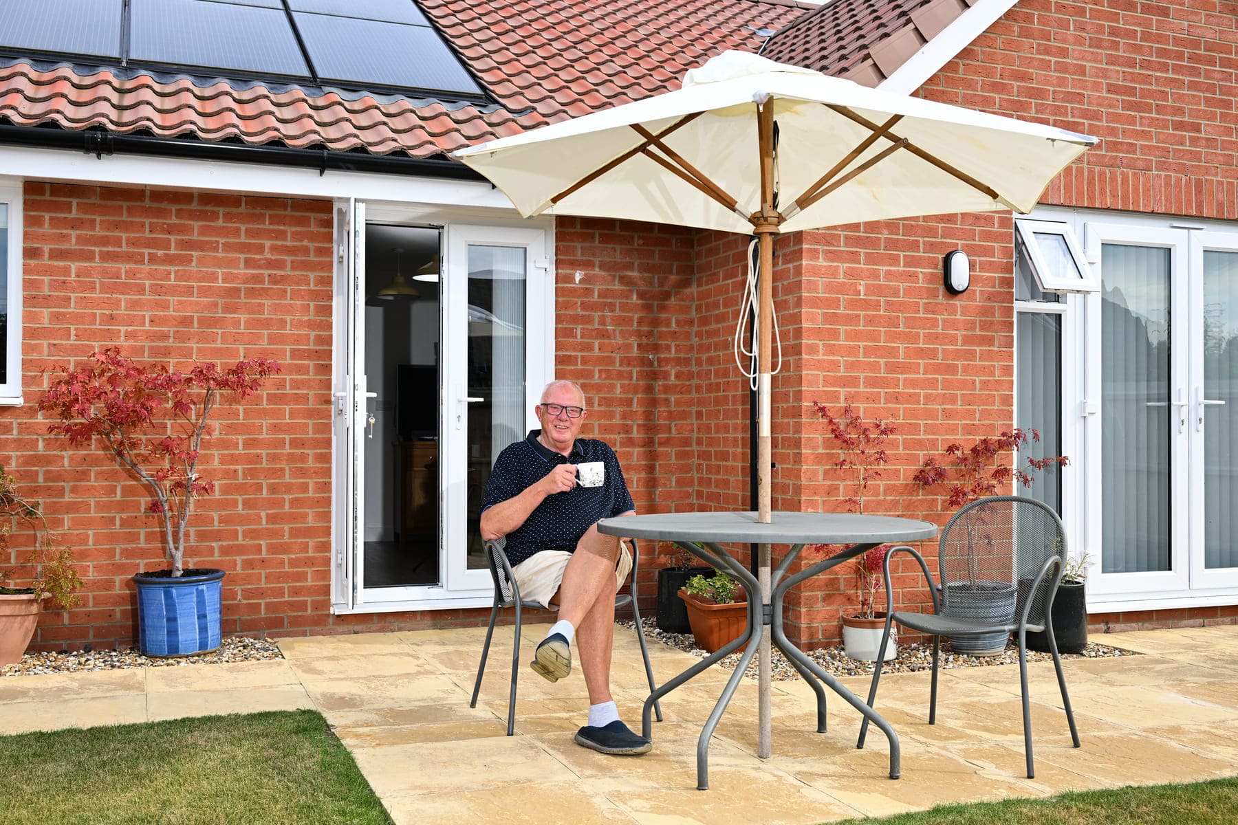 Man sat in garden