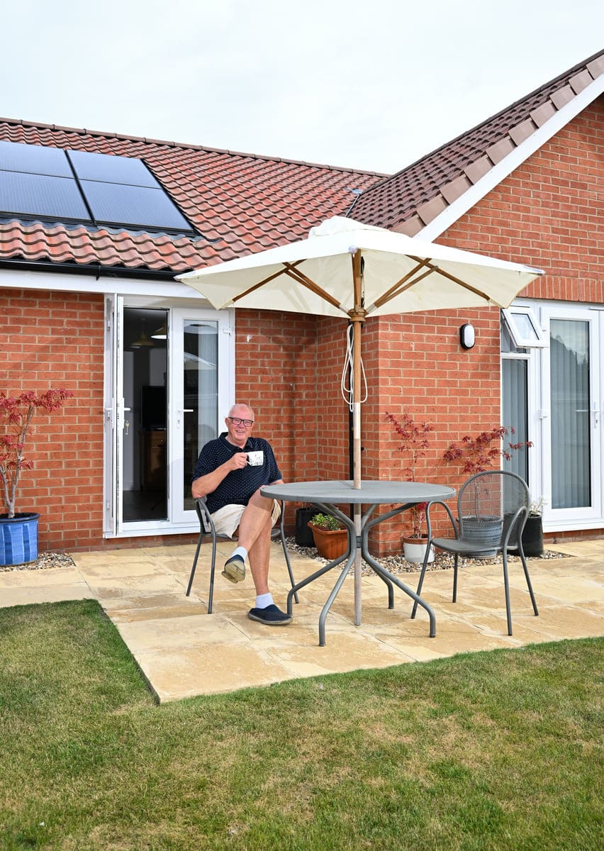 Man sat in garden