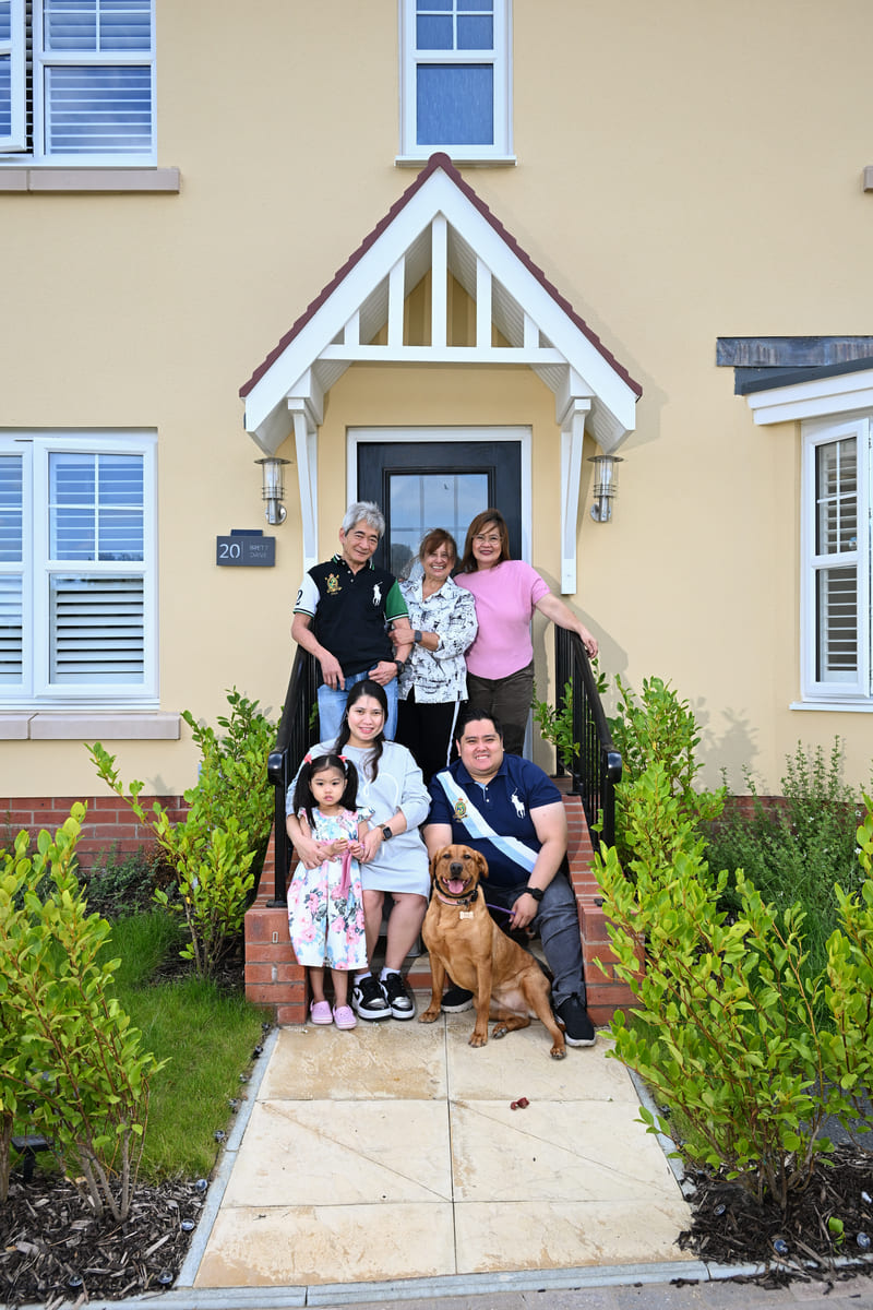 Family outside house