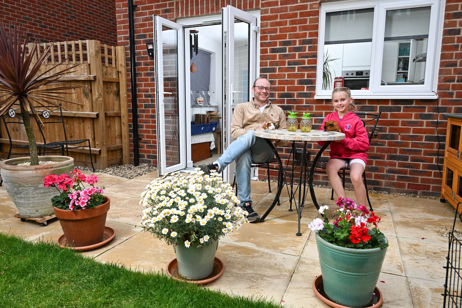 Dad and daughter in garden