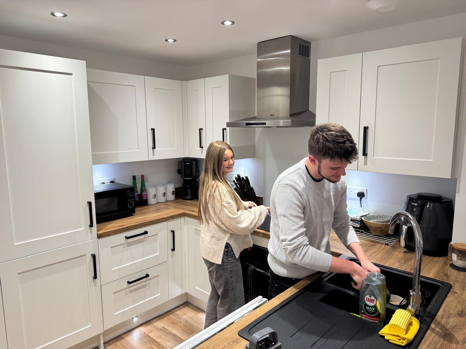 Couple in kitchen