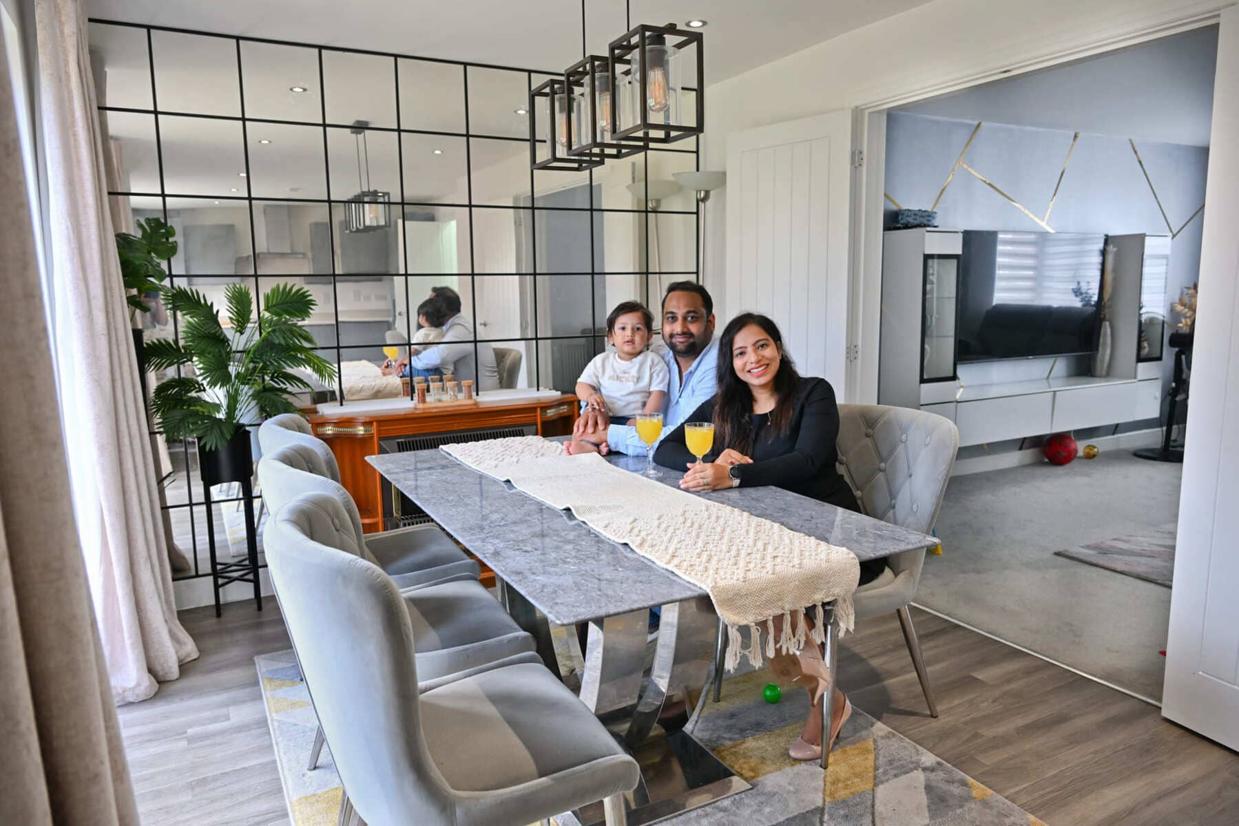 Family sitting at kitchen table