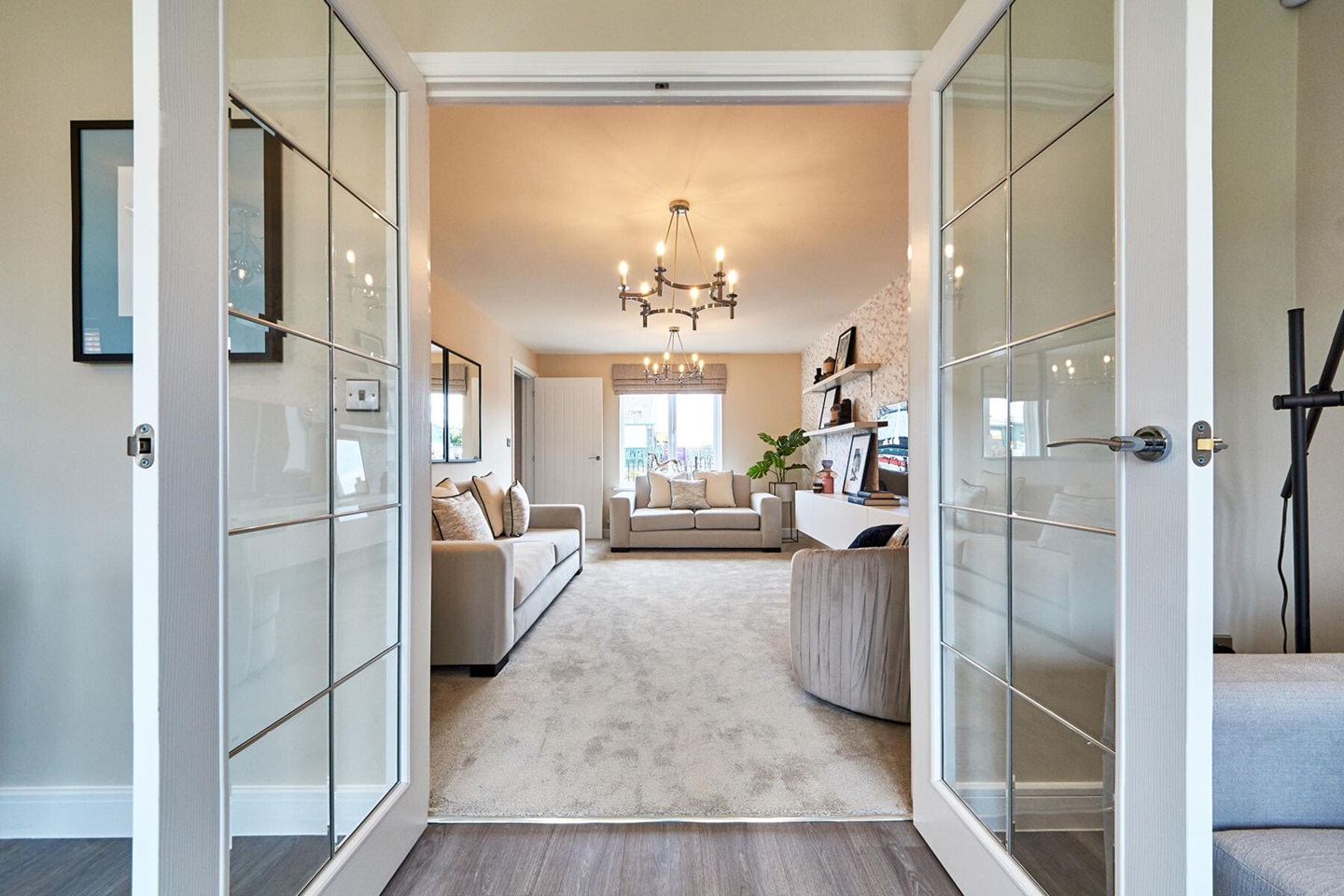 Lounge with doors into kitchen