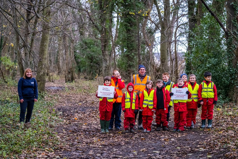 Taylor Wimpey with primary school pupils for the forest school project