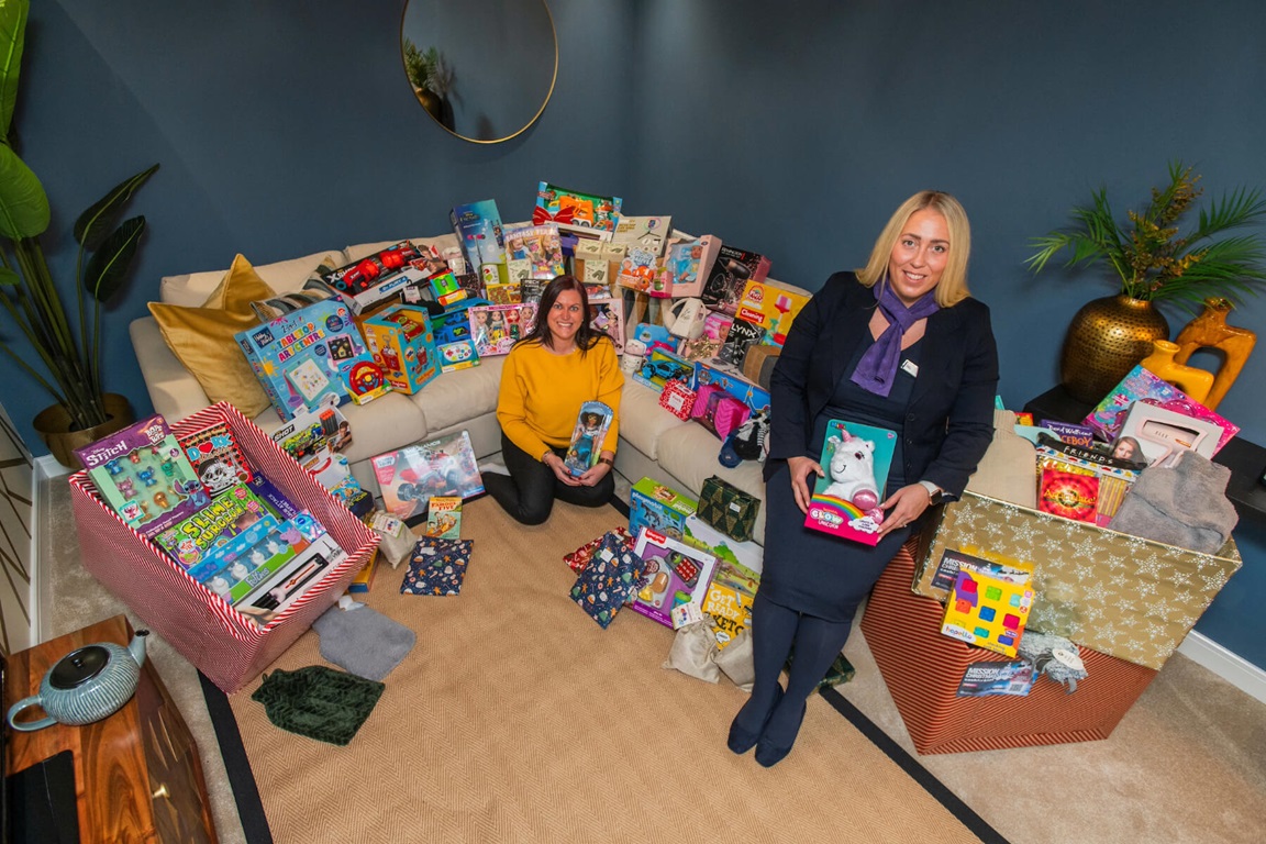 Taylor Wimpey Staff with presents for mission christmas