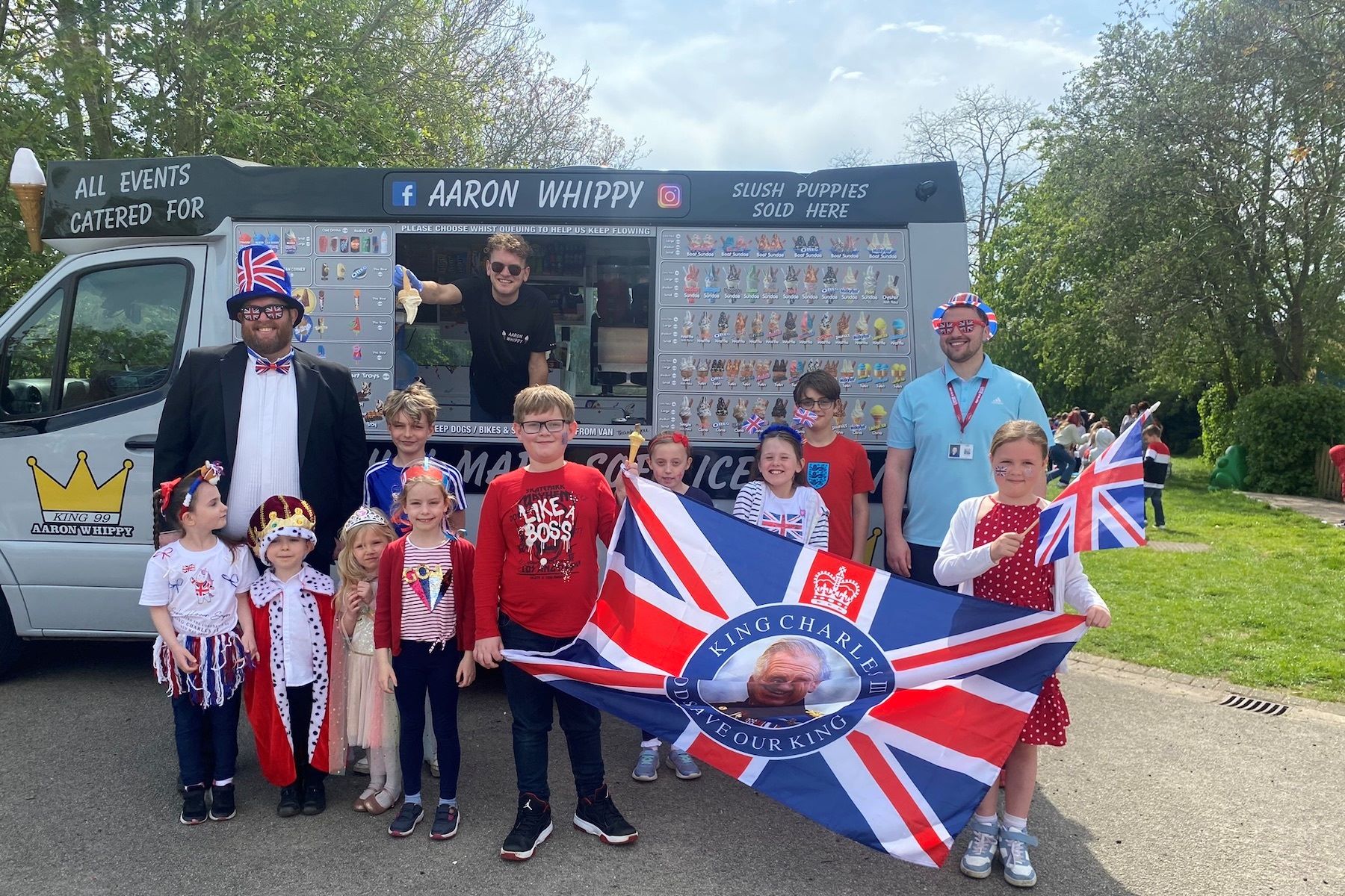 Ice cream van with Primary School children
