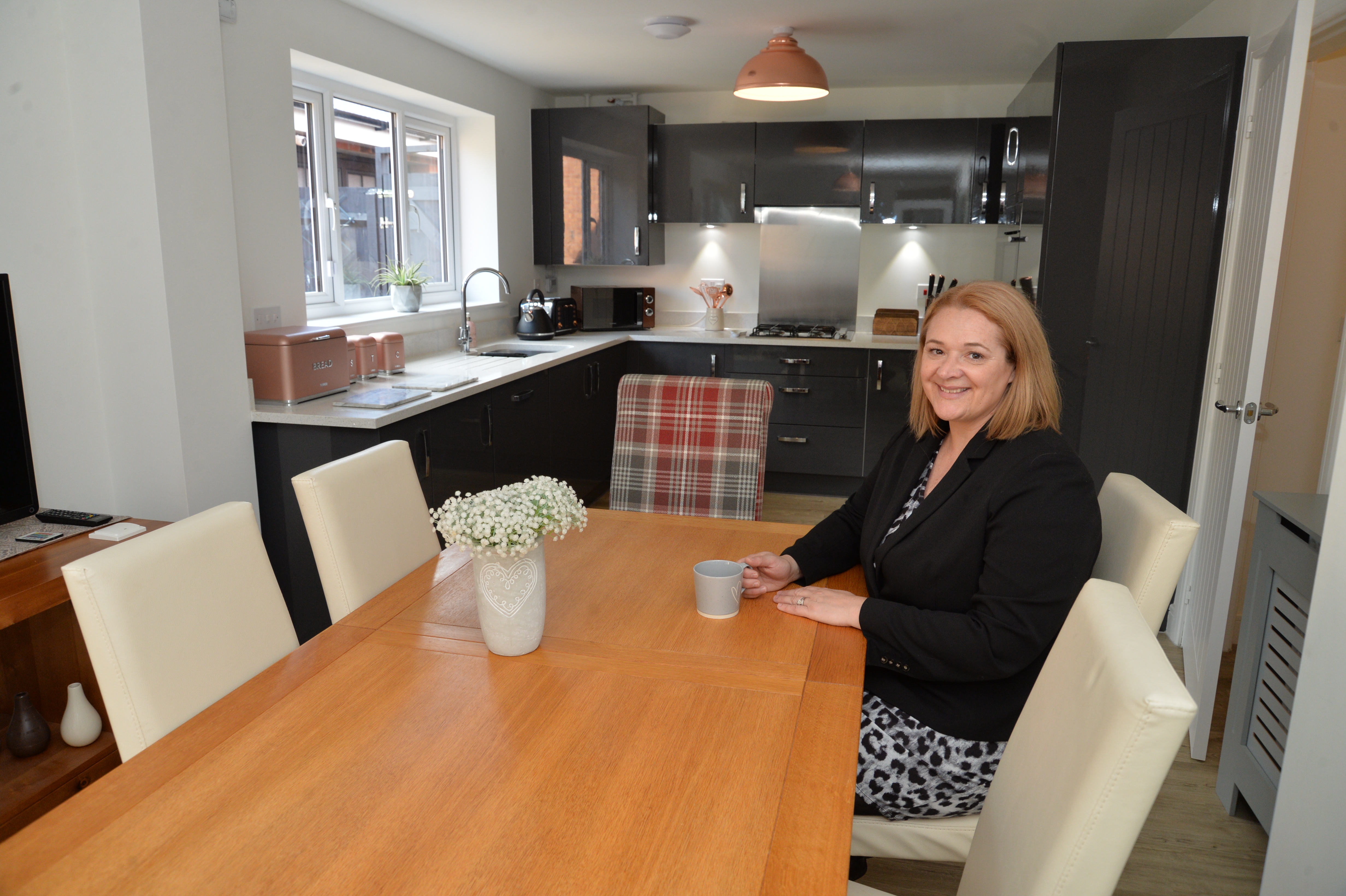 Talana enjoying her new Taylor Wimpey home at Tudor Gate 