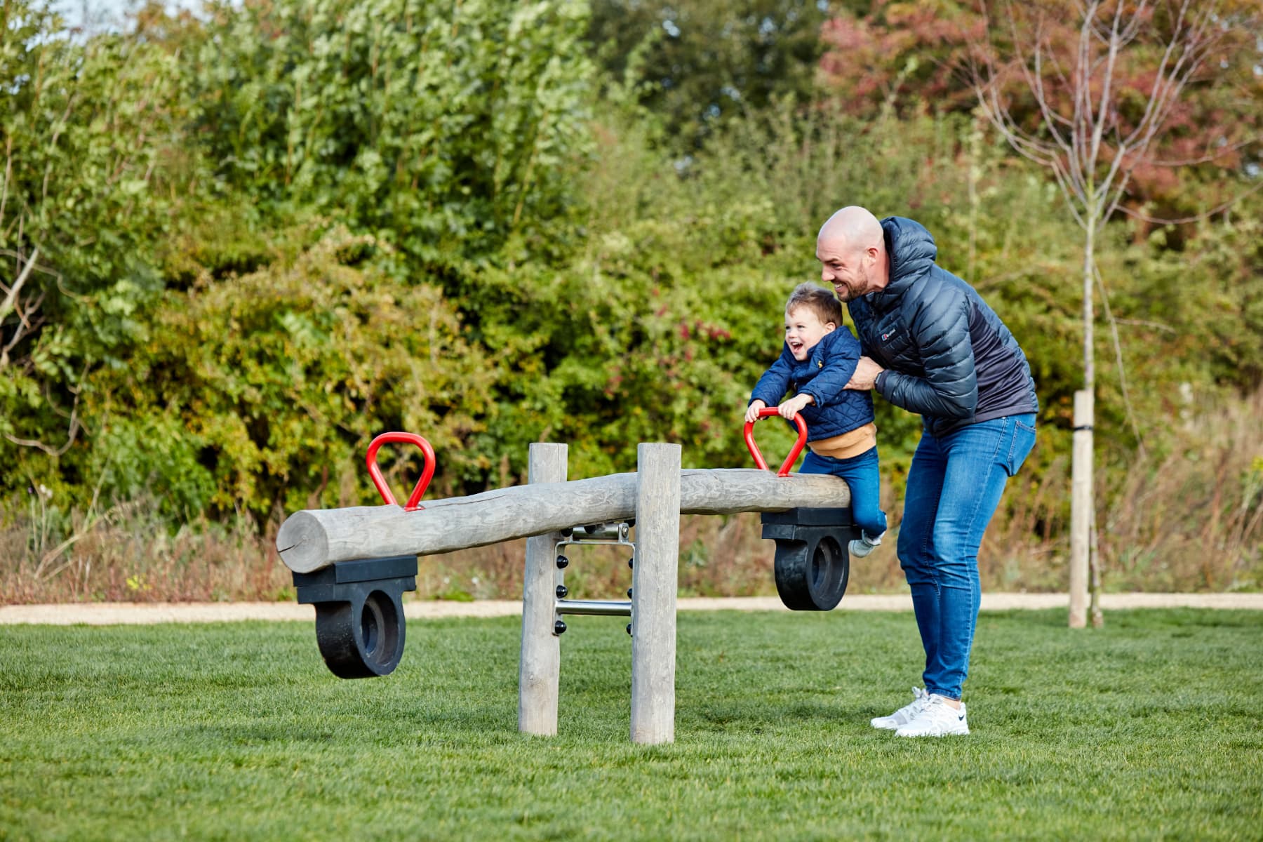 Dad and son in park