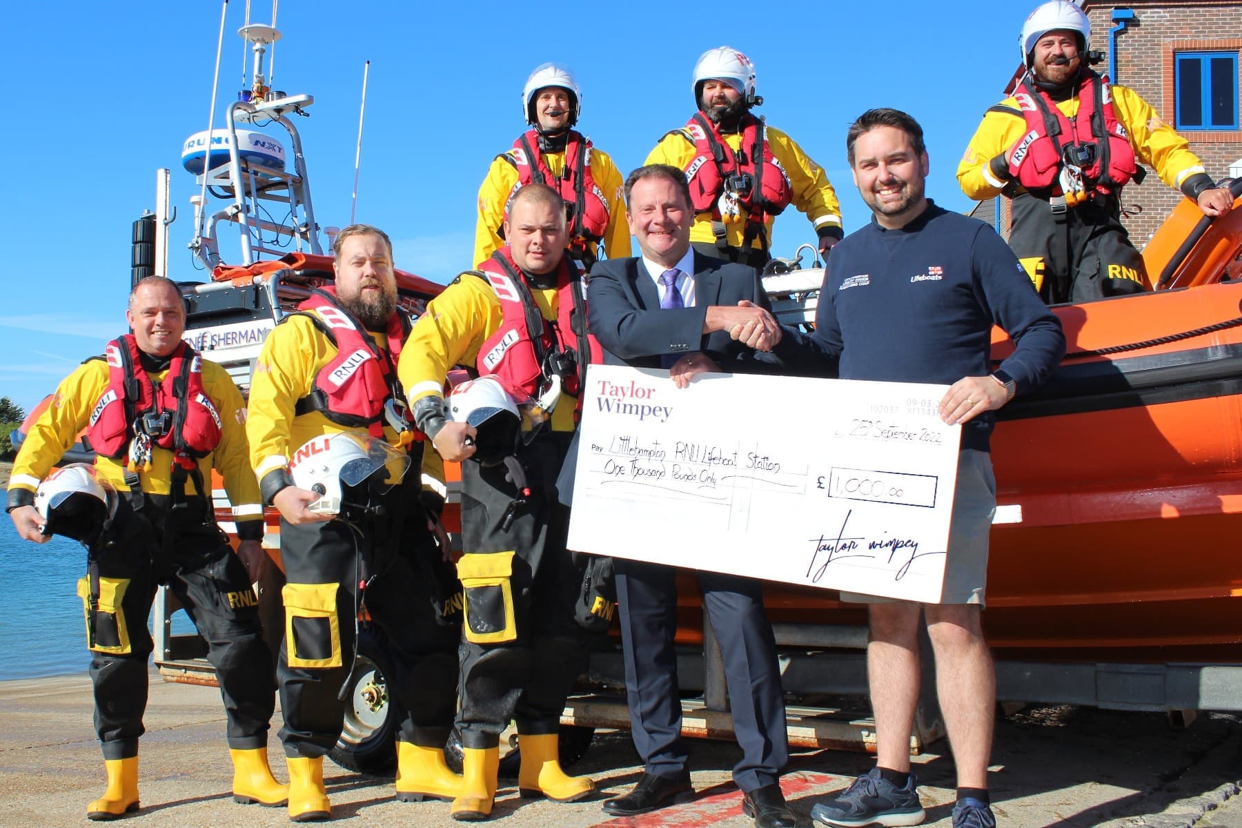 Presenting cheque to RNLI