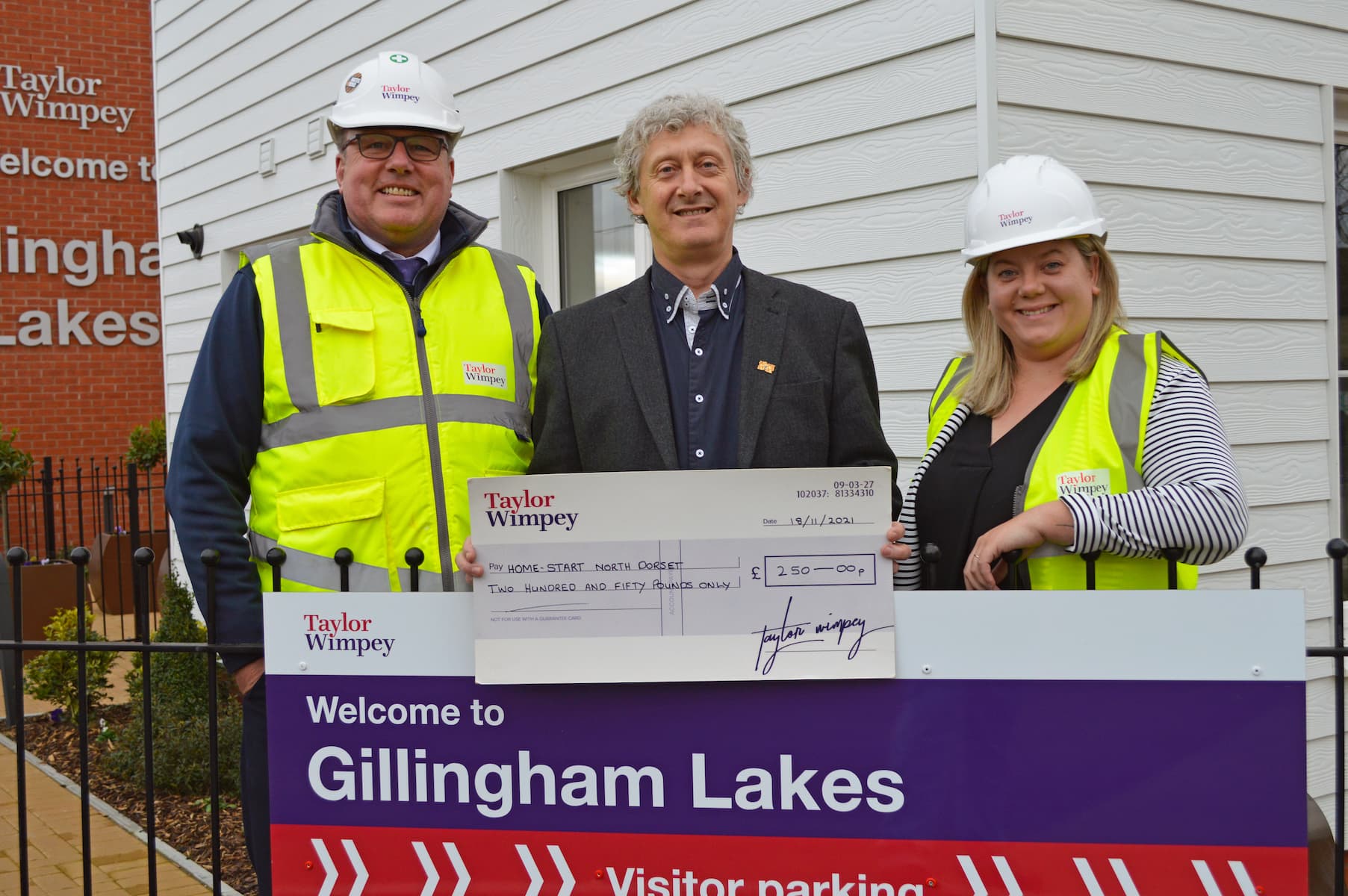 Handing over the cheque