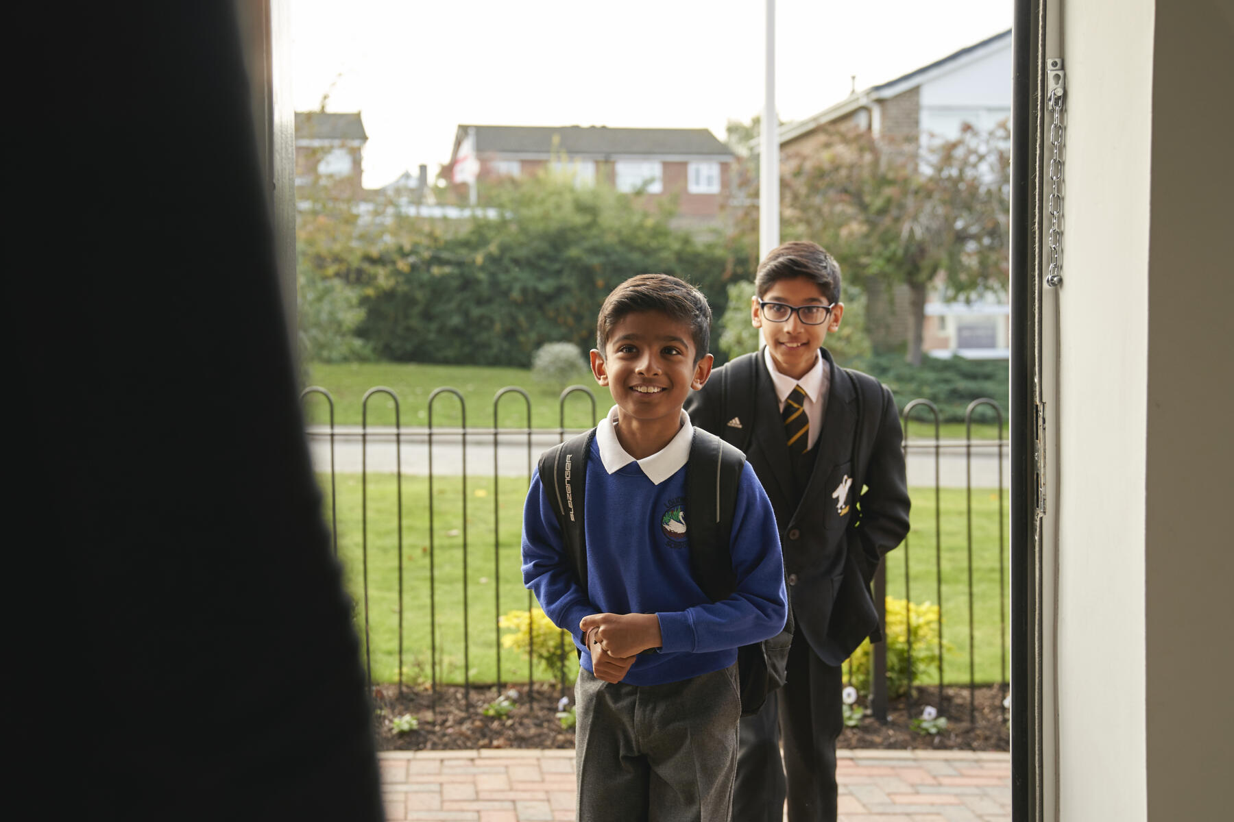 Boys coming in from school