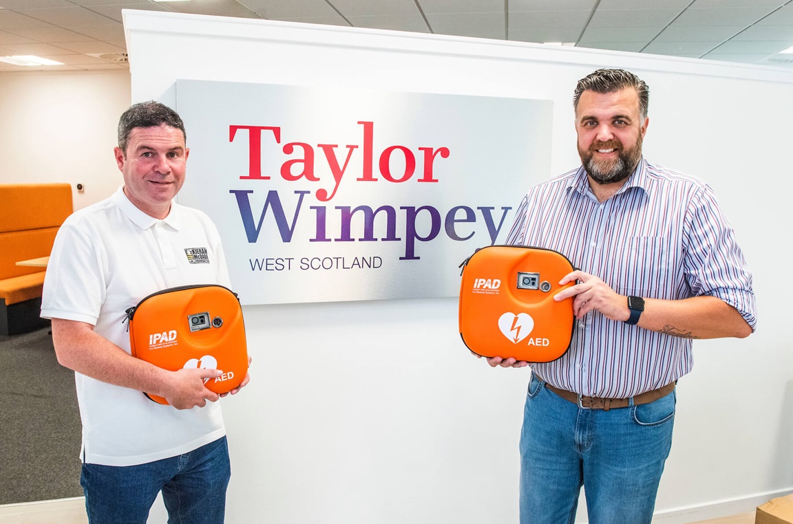 two lifesaving defibrillators to the Kieran McDade Foundation North Lanarkshire Taylor Wimpey