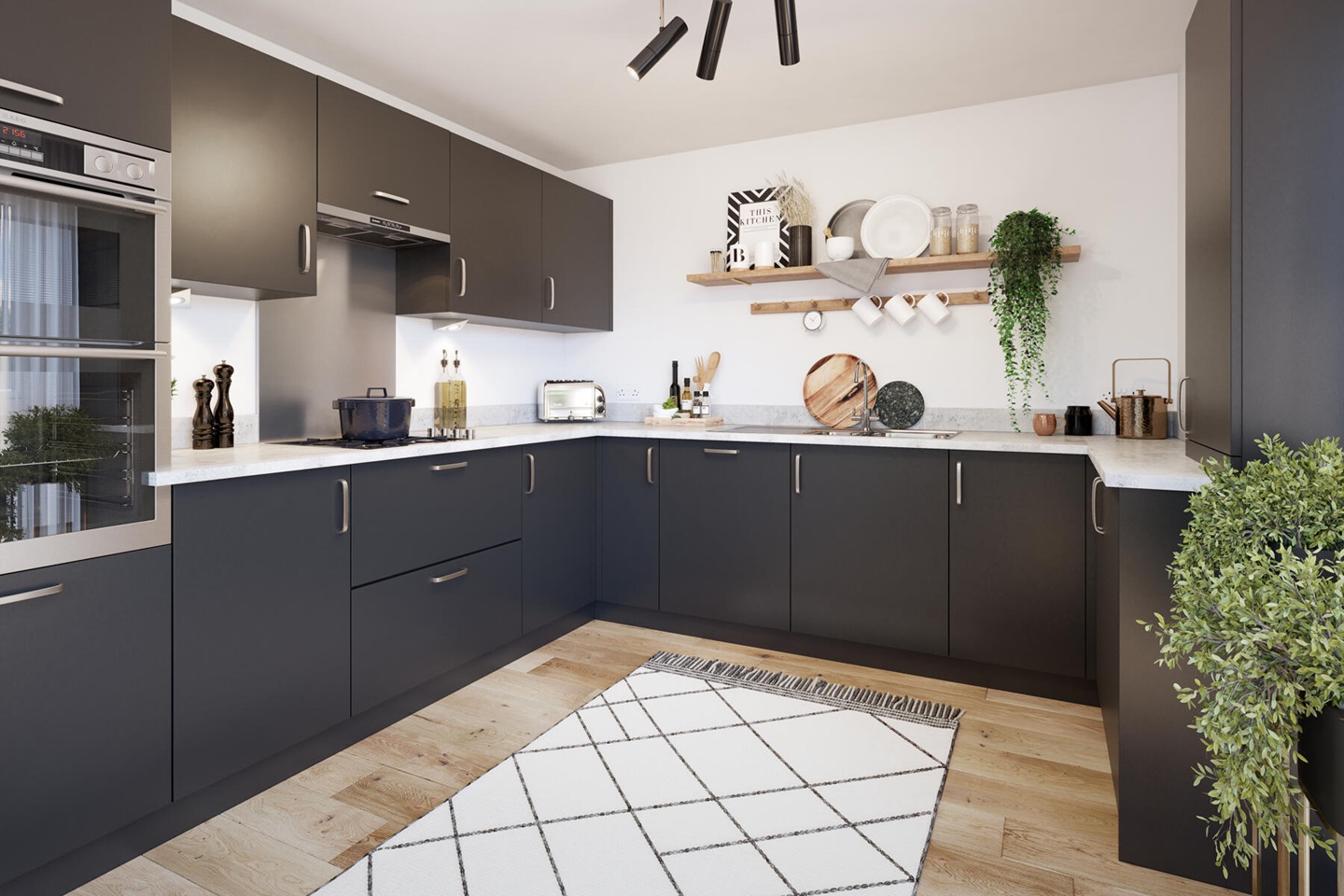 The kitchen benefits from ample storage