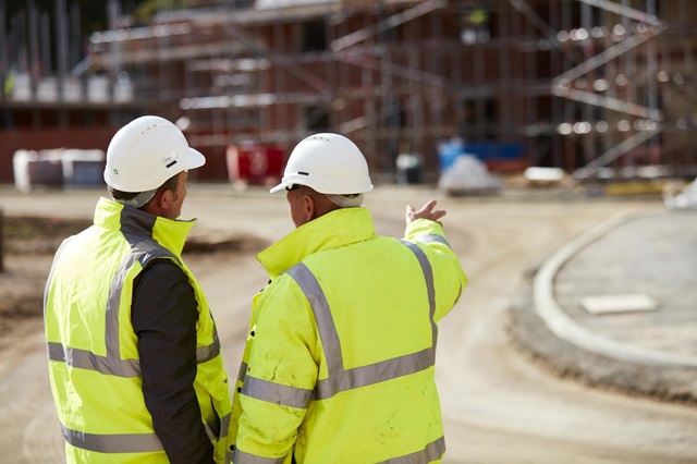 Construction workers talking