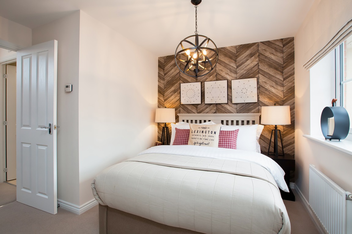 Bedroom with herringbone style woodwork