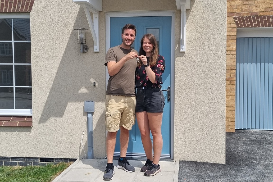 Elliot and Jessica with their new home keys