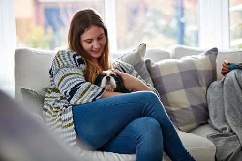 Girl with pet dog